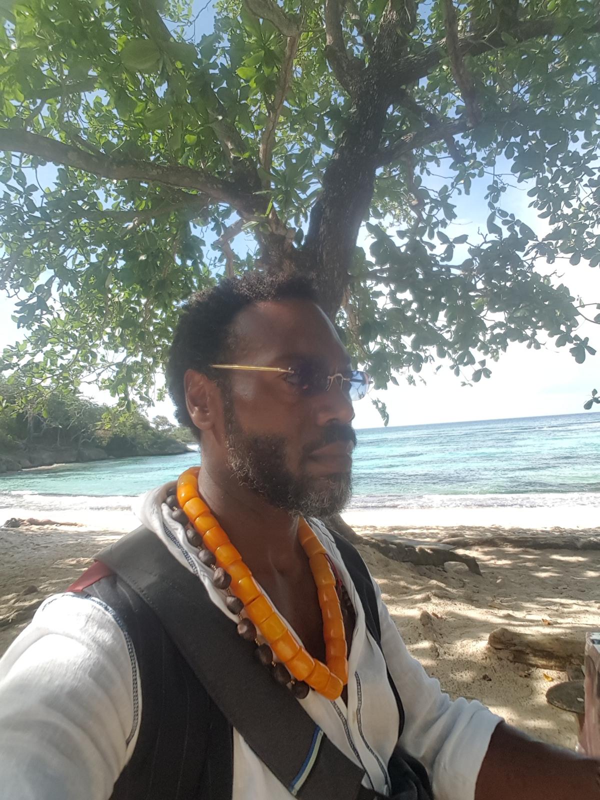Eugene at the beach in Jamaica