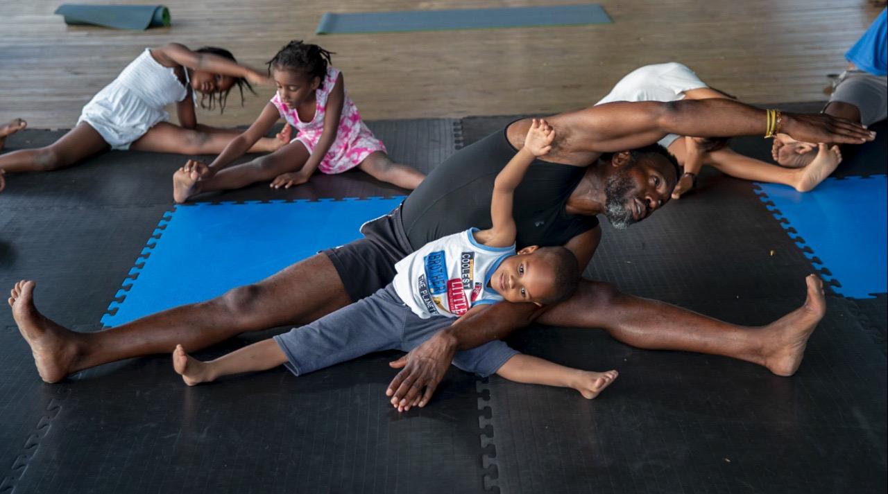 Kids stretching during training